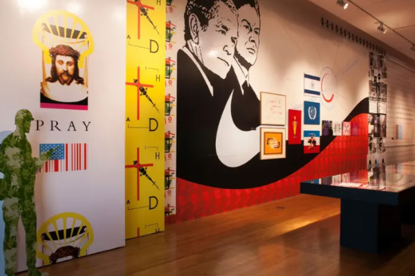 Lily Collins wearing a moped helmet, her face reflected in a rear-view mirror